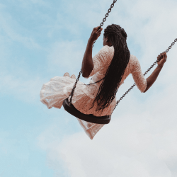 Woman on a swing, healing from her past
