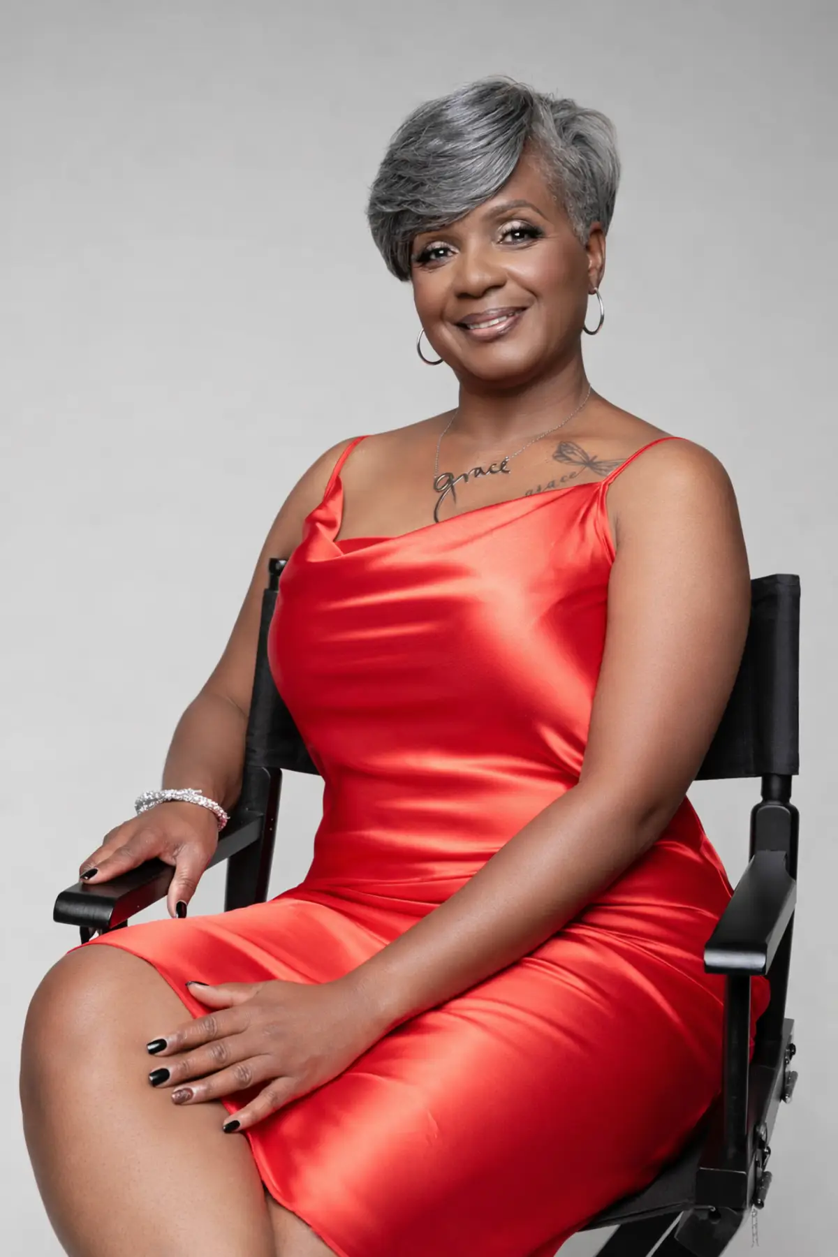 Dione LaChelle in red dress